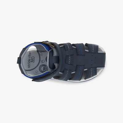 Top view of the Stride Rite Paddy Sandal in navy, displaying the open-toe design and breathable construction.