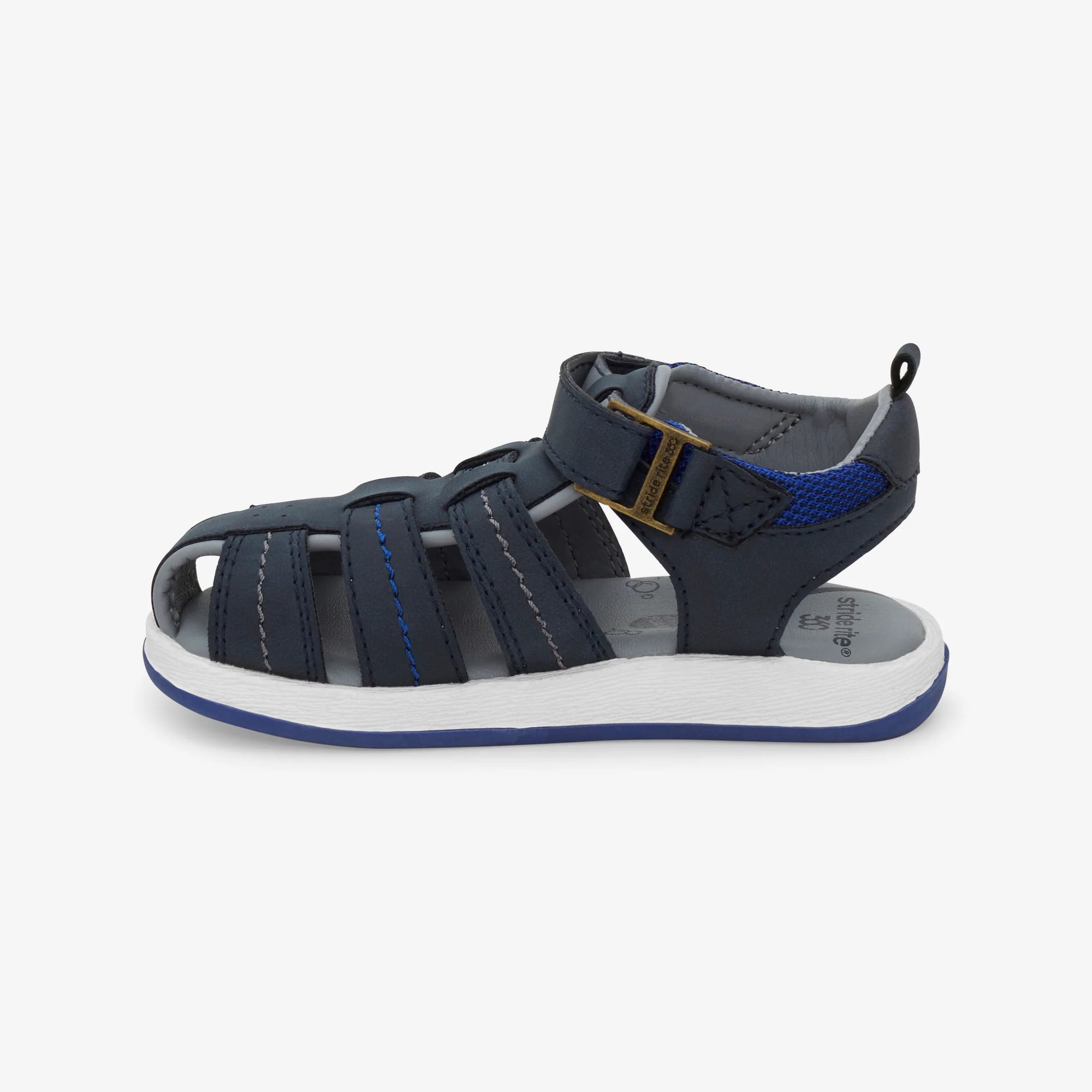 Side view of the Stride Rite Paddy Sandal in navy, showing its flexible, lightweight design for toddlers and kids
